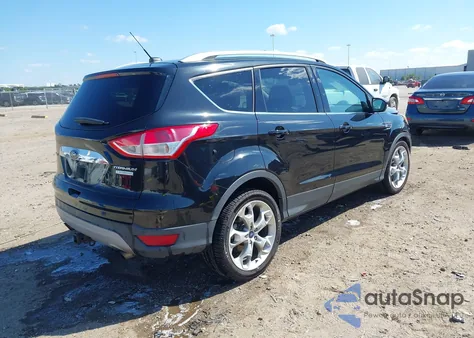 2015 Ford Escape Titanium z USA, uszkodzony, nr VIN 1FMCU0J92FUC59150